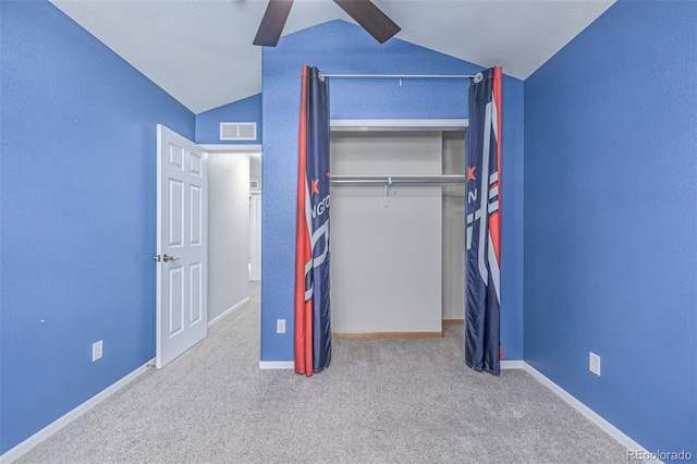 903 Cameron Dr, Severance, CO 80550 - unfurnished bedroom with lofted ceiling, carpet floors, a closet, and a ceiling fan