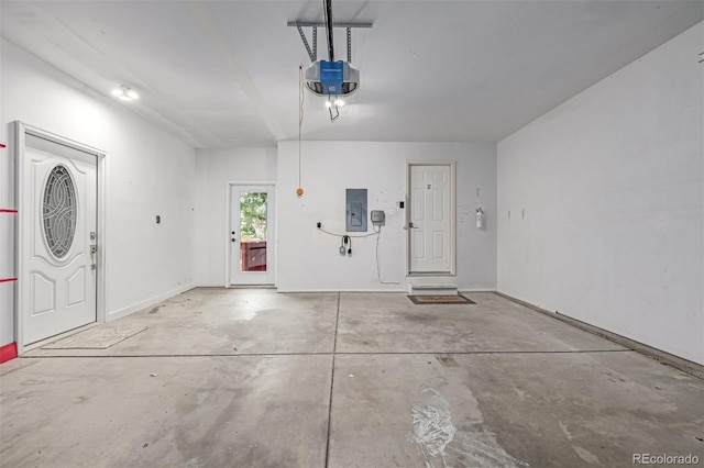 903 Cameron Dr, Severance, CO 80550 - garage featuring a garage door opener and electric panel