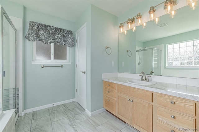 903 Cameron Dr, Severance, CO 80550 - full bath with a shower with door, vanity, and marble finish floors