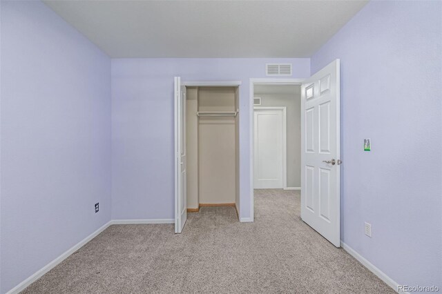 903 Cameron Dr, Severance, CO 80550 - unfurnished bedroom with light colored carpet and a closet