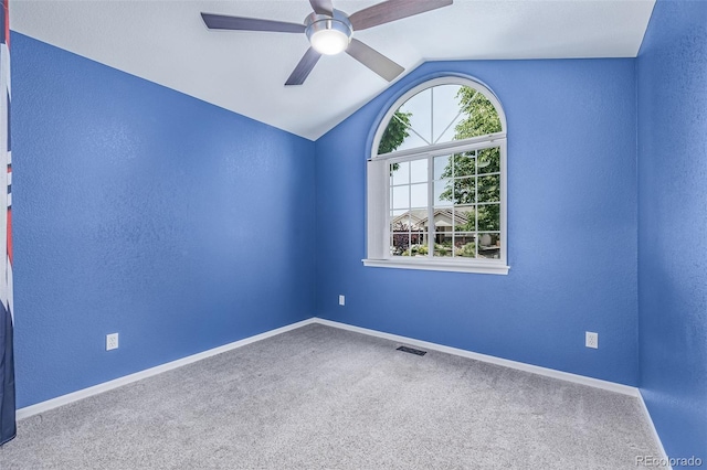903 Cameron Dr, Severance, CO 80550 - carpeted empty room with a ceiling fan, lofted ceiling, and a textured wall