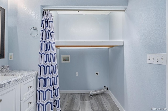 903 Cameron Dr, Severance, CO 80550 - washroom featuring hookup for a washing machine and hookup for an electric dryer