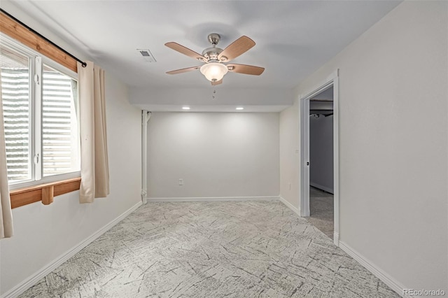 903 Cameron Dr, Severance, CO 80550 - carpeted empty room with a ceiling fan and plenty of natural light