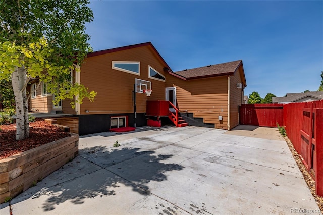 903 Cameron Dr, Severance, CO 80550 - back of property featuring a fenced backyard and a patio