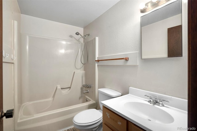 full bathroom with vanity, shower / bathtub combination, and toilet