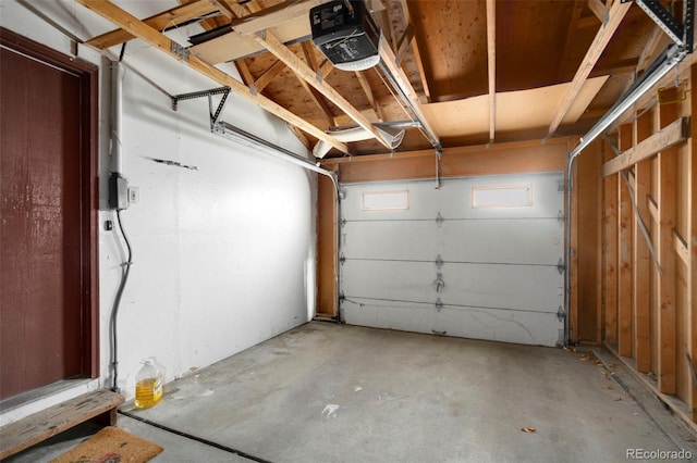 garage featuring a garage door opener