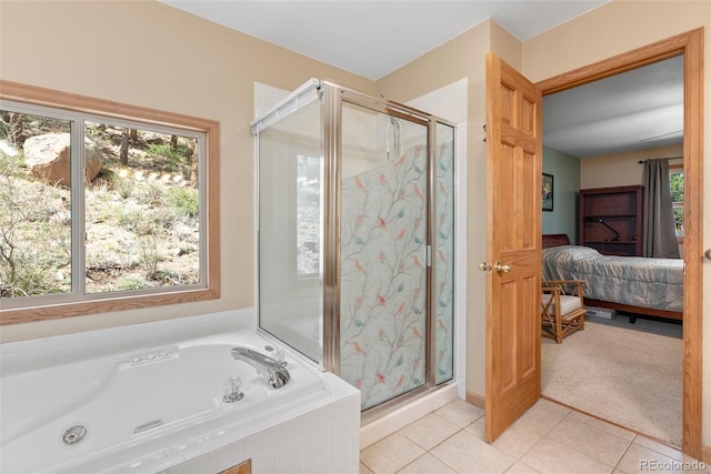 29 Cedar Ln, Bailey, CO 80421 - ensuite bathroom with plenty of natural light, a stall shower, a bath, and tile patterned flooring