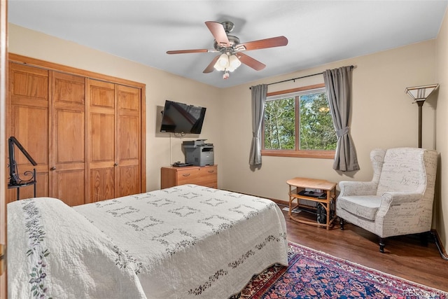 29 Cedar Ln, Bailey, CO 80421 - bedroom with wood finished floors, a closet, a ceiling fan, and baseboards