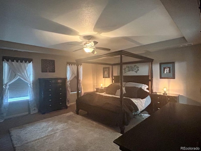 bedroom featuring carpet flooring and visible vents