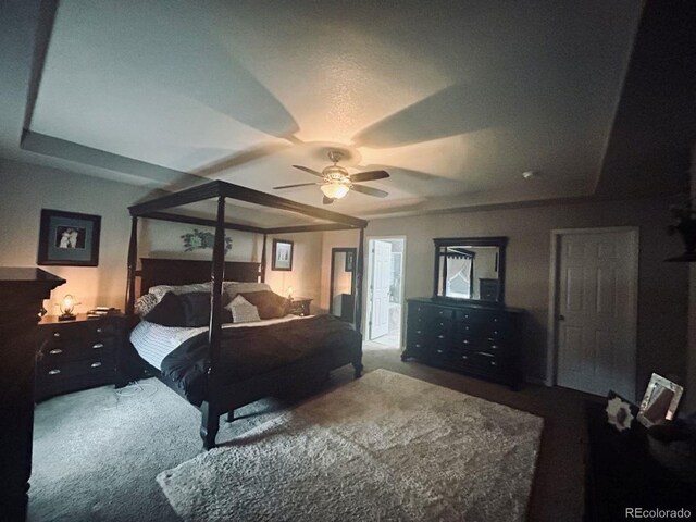 carpeted bedroom with ceiling fan