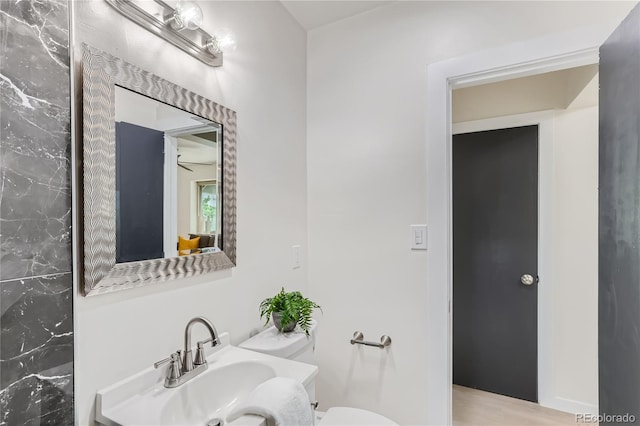 2100 N Franklin St Unit 20, Denver, CO 80205 - bathroom with toilet and vanity