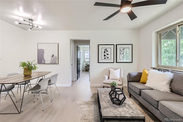 2100 N Franklin St Unit 20, Denver, CO 80205 - living room featuring light wood-style floors and a ceiling fan