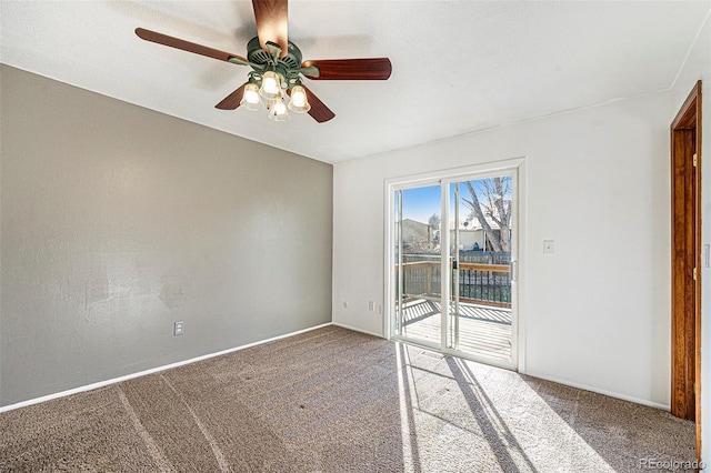 empty room featuring carpet flooring and baseboards