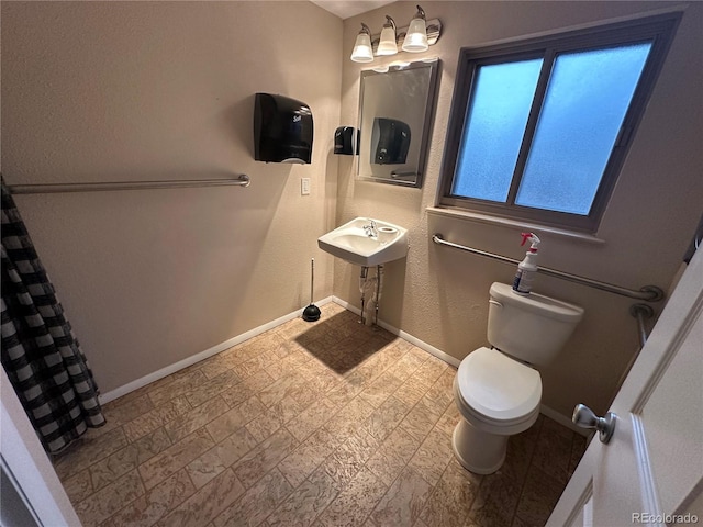 bathroom featuring toilet