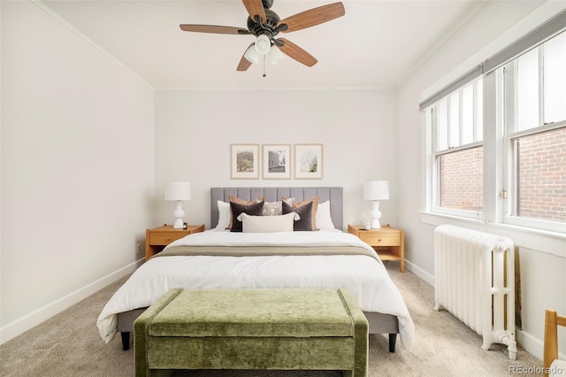 730 Cook St, Denver, CO 80206 - bedroom featuring radiator, light colored carpet, baseboards, crown molding, and ceiling fan