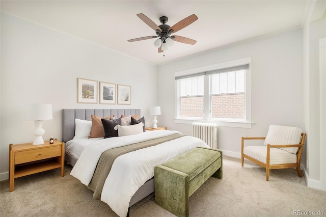 730 Cook St, Denver, CO 80206 - bedroom with radiator heating unit, light colored carpet, baseboards, ornamental molding, and ceiling fan