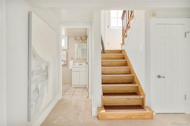 730 Cook St, Denver, CO 80206 - staircase with carpet floors and healthy amount of natural light