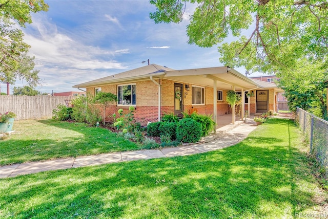 view of front of home with a front yard