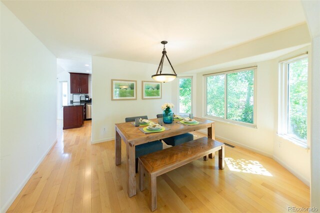 1881 Alma Ln, Superior, CO 80027 - dining area with baseboards and light wood-type flooring