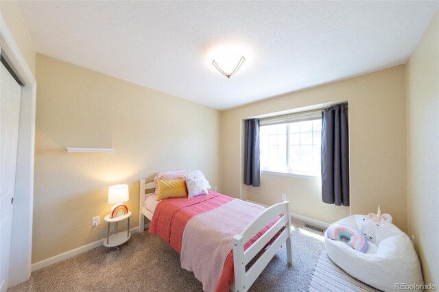 1881 Alma Ln, Superior, CO 80027 - bedroom with carpet floors and a closet