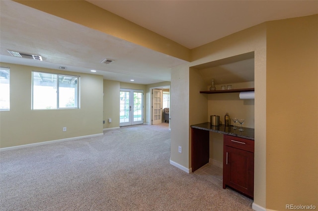 1881 Alma Ln, Superior, CO 80027 - indoor wet bar with light carpet, french doors, and recessed lighting