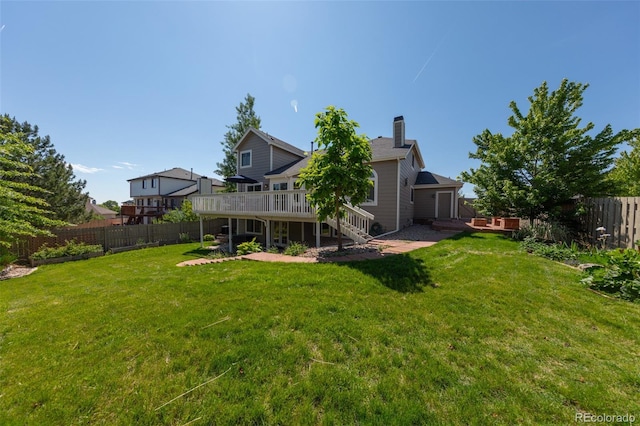 1881 Alma Ln, Superior, CO 80027 - fenced backyard with a wooden deck and stairway