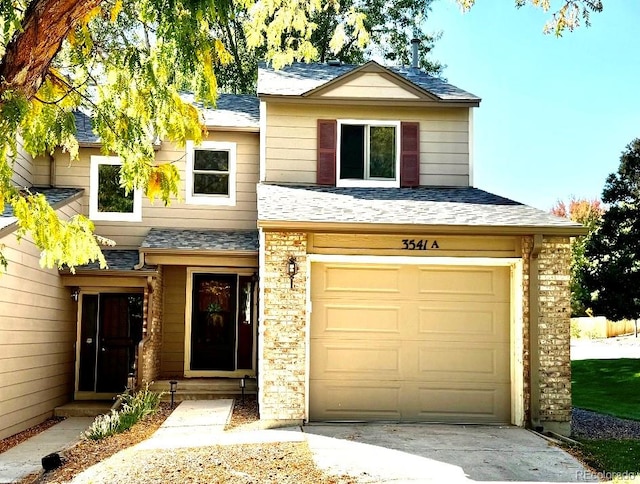 view of front of property featuring a garage