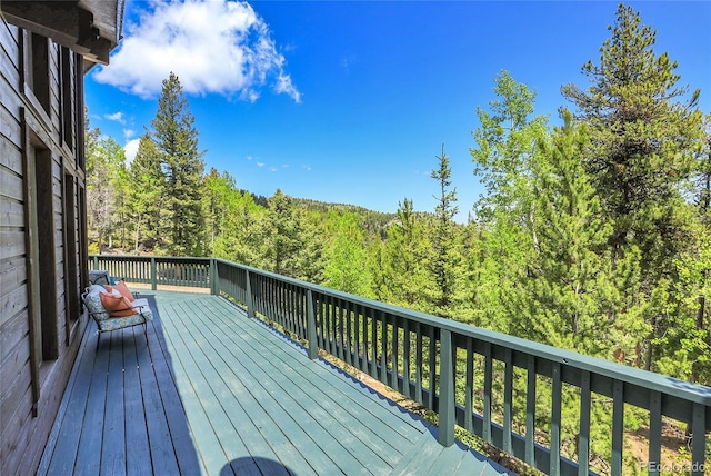11333 Conifer Mountain Rd, Conifer, CO 80433 - wooden terrace with a forest view