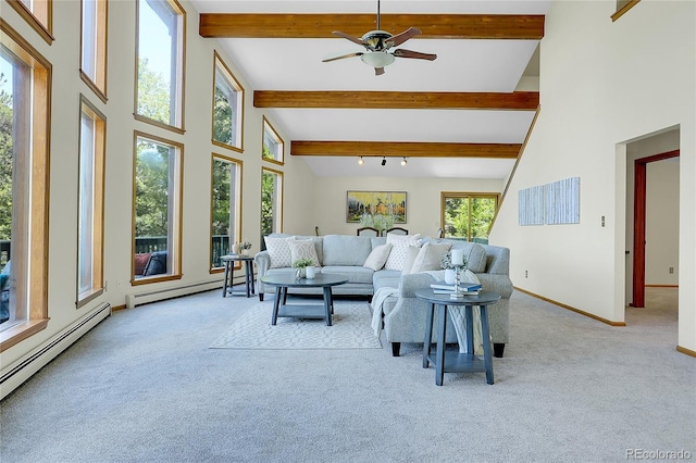 11333 Conifer Mountain Rd, Conifer, CO 80433 - living room featuring light carpet, baseboard heating, ceiling fan, beam ceiling, and high vaulted ceiling