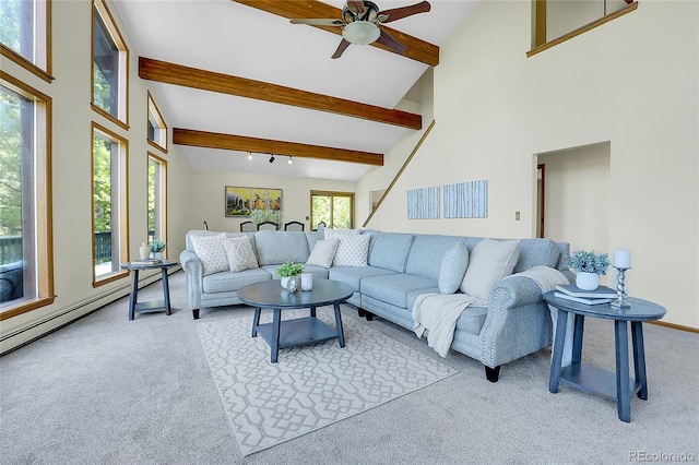 11333 Conifer Mountain Rd, Conifer, CO 80433 - carpeted living area with a ceiling fan, beamed ceiling, and high vaulted ceiling
