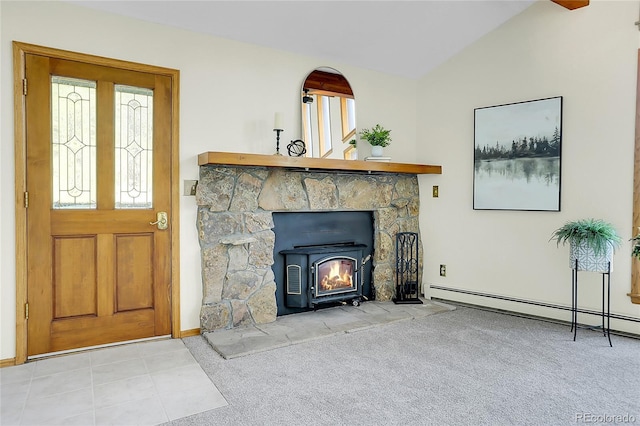 11333 Conifer Mountain Rd, Conifer, CO 80433 - entryway featuring a baseboard heating unit, vaulted ceiling, and carpet flooring