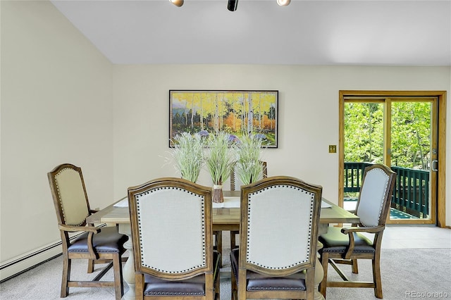 11333 Conifer Mountain Rd, Conifer, CO 80433 - carpeted dining area featuring a baseboard radiator