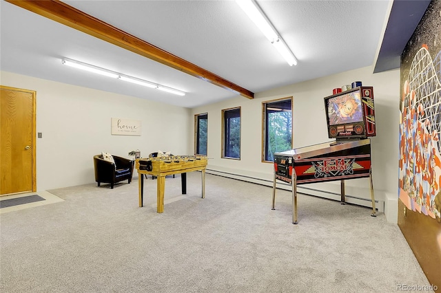 11333 Conifer Mountain Rd, Conifer, CO 80433 - playroom with carpet floors, beamed ceiling, and a baseboard heating unit