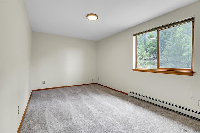 11333 Conifer Mountain Rd, Conifer, CO 80433 - carpeted spare room with baseboard heating and baseboards