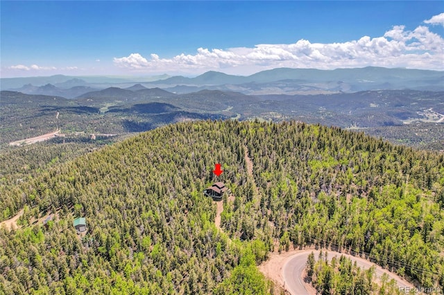 11333 Conifer Mountain Rd, Conifer, CO 80433 - bird's eye view of a heavily wooded area and a mountain backdrop