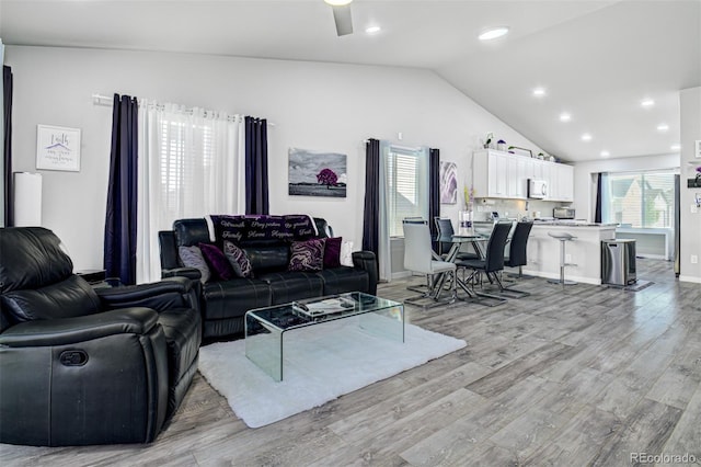2742 Show Hunter Way, Colorado Springs, CO 80922 - living area featuring vaulted ceiling, light wood-style flooring, recessed lighting, a ceiling fan, and baseboards
