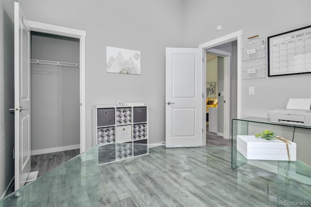 2742 Show Hunter Way, Colorado Springs, CO 80922 - bedroom featuring wood finished floors, a closet, and baseboards