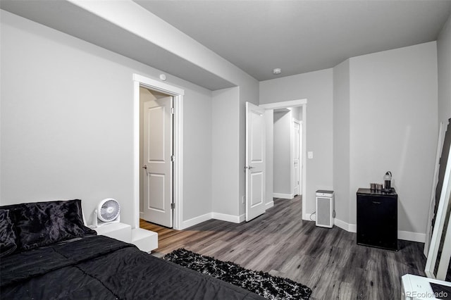 2742 Show Hunter Way, Colorado Springs, CO 80922 - bedroom with dark wood-type flooring and baseboards