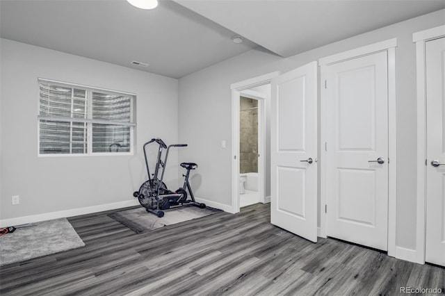2742 Show Hunter Way, Colorado Springs, CO 80922 - exercise area featuring wood finished floors and baseboards
