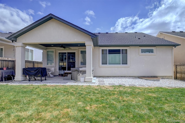 2742 Show Hunter Way, Colorado Springs, CO 80922 - back of property with a ceiling fan, a patio, stucco siding, and a shingled roof