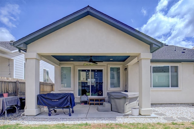 2742 Show Hunter Way, Colorado Springs, CO 80922 - rear view of property with a ceiling fan, stucco siding, a patio area, and a shingled roof