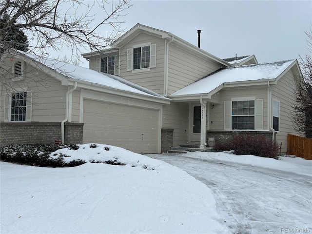 front of property with a garage