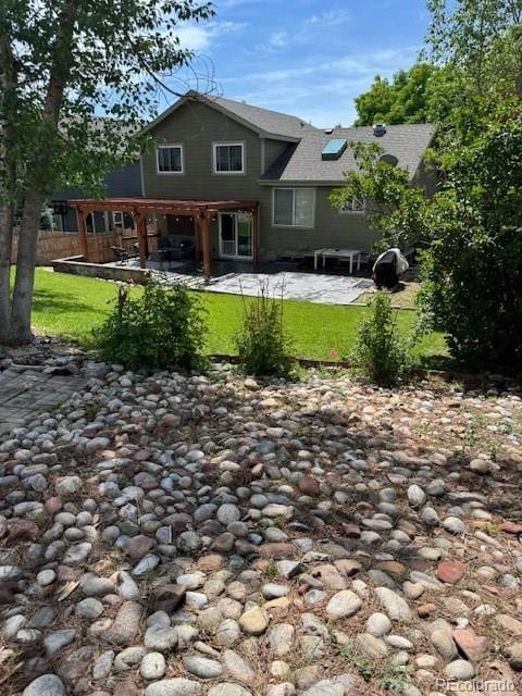5201 E 127th Dr, Thornton, CO 80241 - back of house featuring a patio area