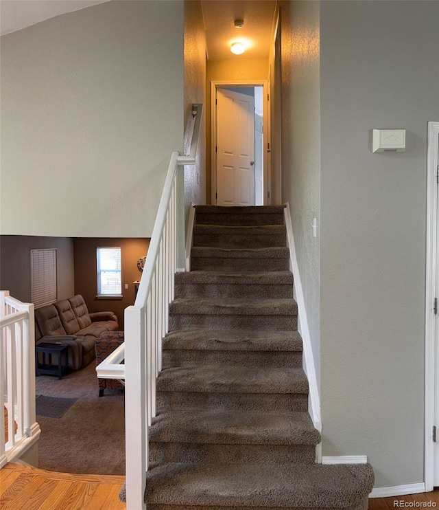 5201 E 127th Dr, Thornton, CO 80241 - stairway with wood finished floors and baseboards