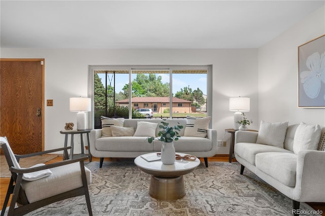 7135 S Sherman St, Centennial, CO 80122 - living area featuring baseboards and wood finished floors