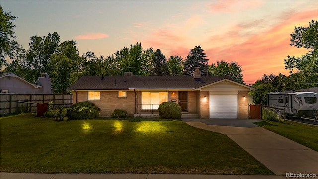 7135 S Sherman St, Centennial, CO 80122 - ranch-style home featuring an attached garage, brick siding, concrete driveway, a porch, and a chimney