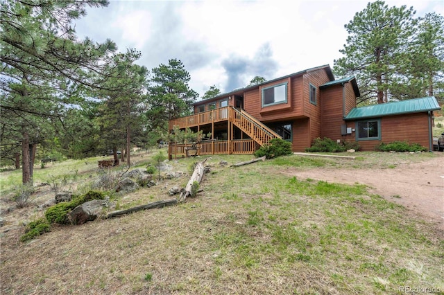 917 Bluebird Ln, Bailey, CO 80421 - back of house featuring a deck and stairway