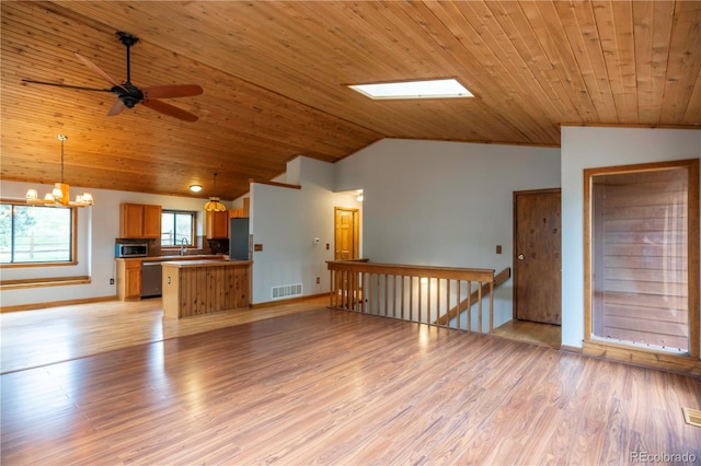 917 Bluebird Ln, Bailey, CO 80421 - unfurnished living room with vaulted ceiling, a ceiling fan, light wood-type flooring, baseboards, and wood ceiling