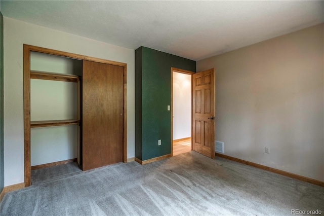 917 Bluebird Ln, Bailey, CO 80421 - unfurnished bedroom featuring a closet, carpet, and baseboards