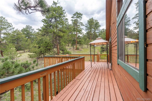 917 Bluebird Ln, Bailey, CO 80421 - wooden terrace featuring a gazebo